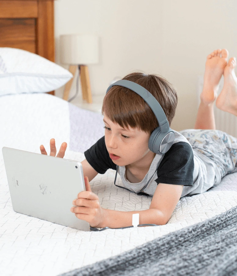 person wearing headphones listening to audio